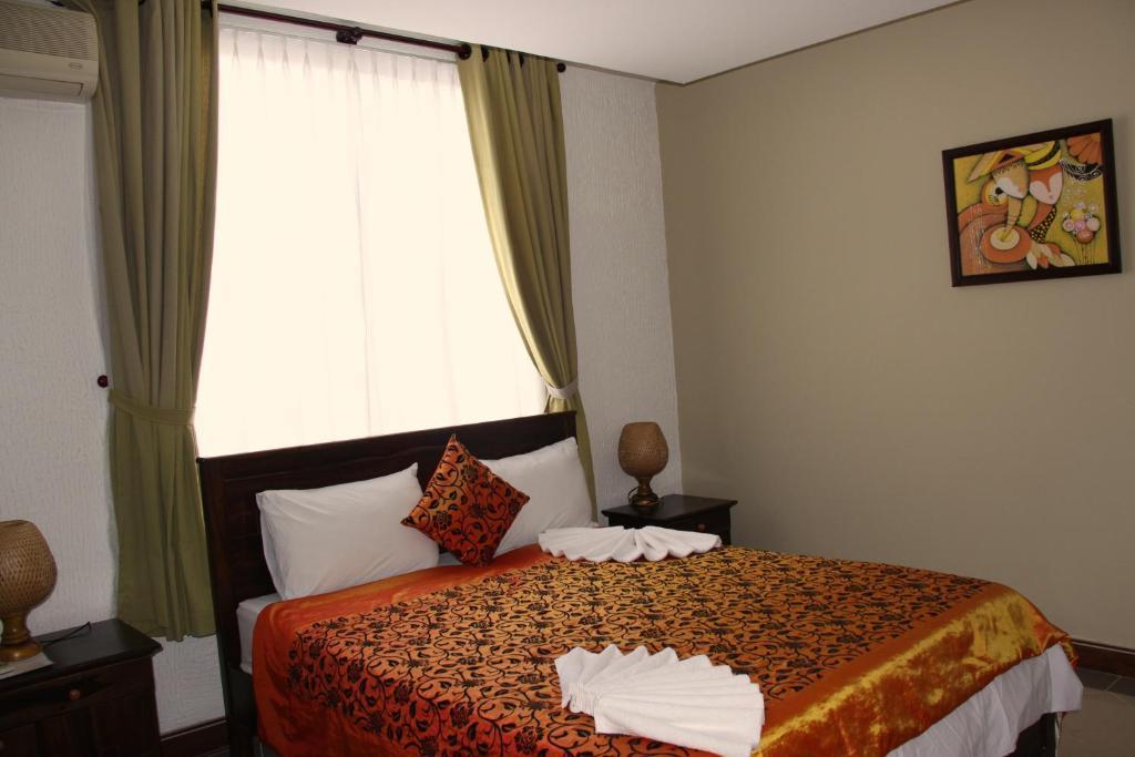 Xin Chao Hotel Mũi Né Rom bilde